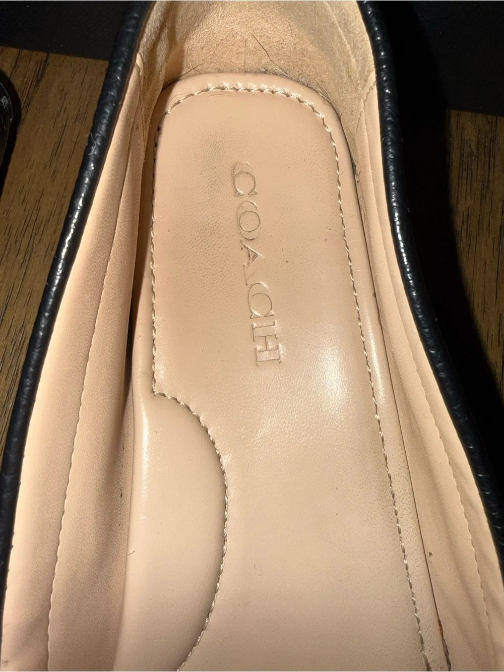 Coach Black Leather Loafers with Gold Chain Accent